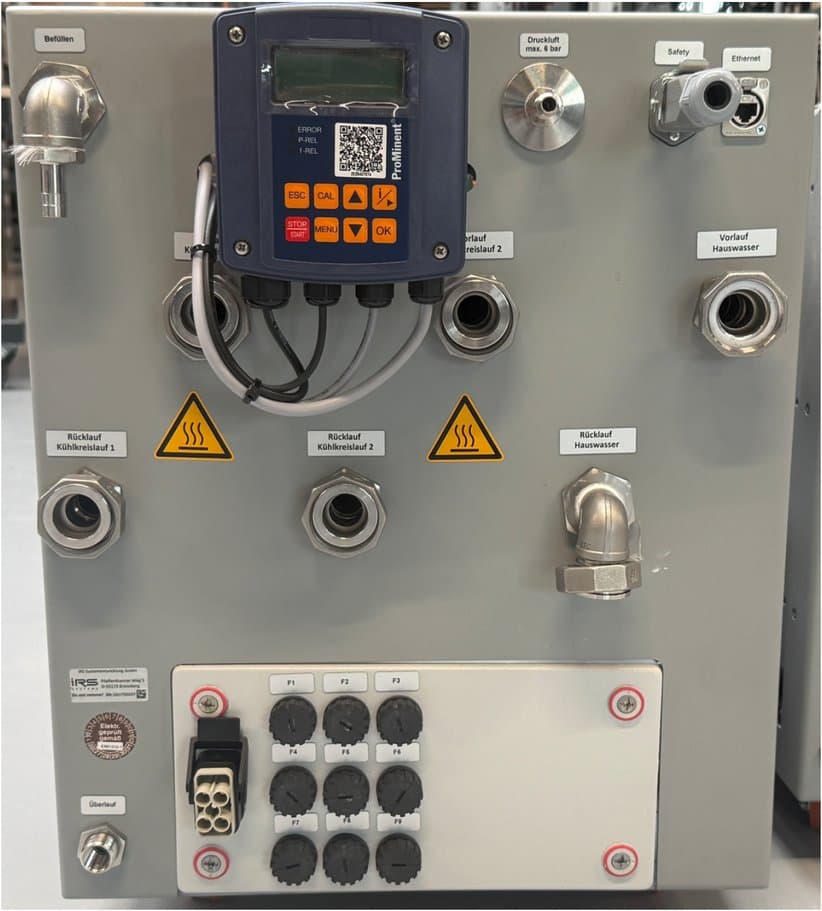Rear of the IRS ICEcube with connections and warning signs