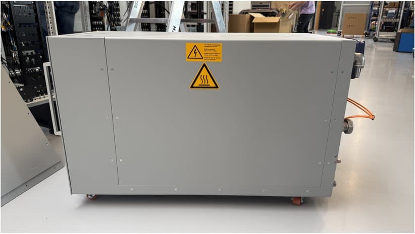 Side view of the IRS ICEcube with warning signs
