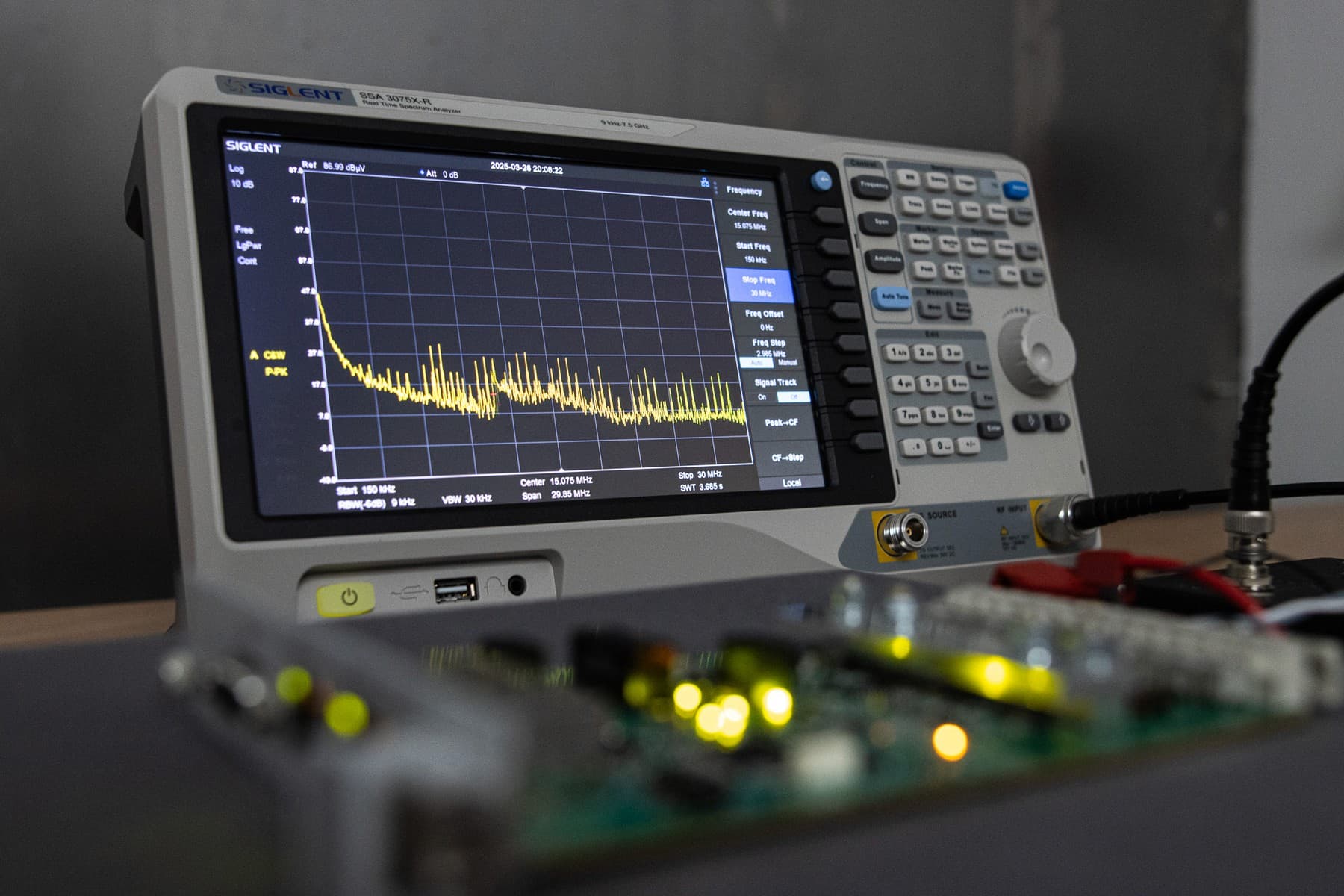 Spectrum analyzer during an EMC measurement on an assembled circuit board